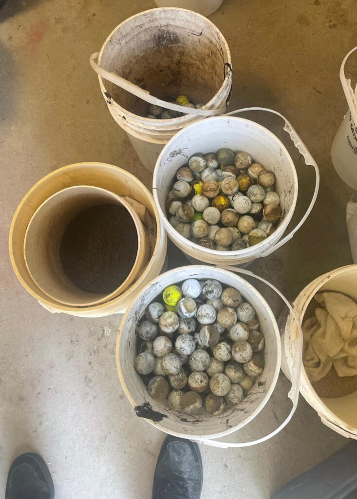 golf balls pulled out of creek at Quaker Ridge